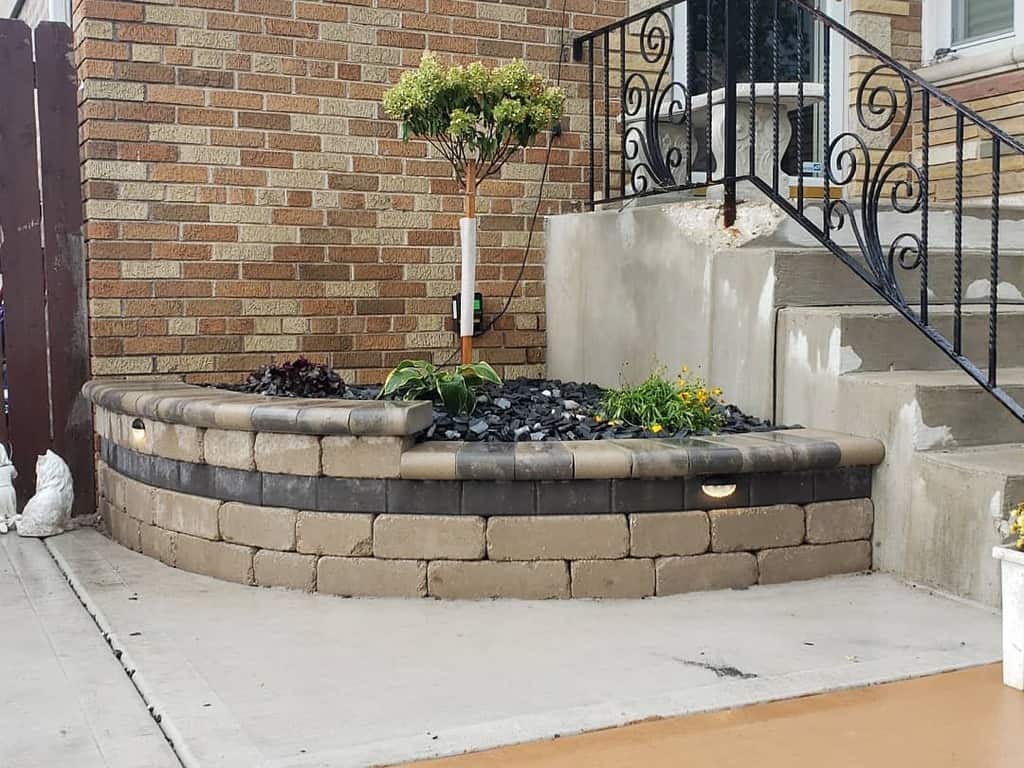 small curved brick garden wall front yard
