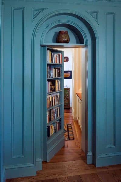 curved wall molding with bookcase hidden door