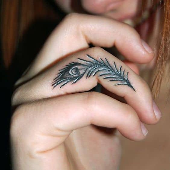 Cute Finger Black Peacock Feather Tattoo