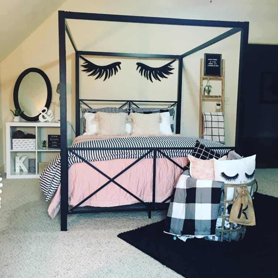 gilr bedroom black four post bed eyebrow wall art ladder storage 