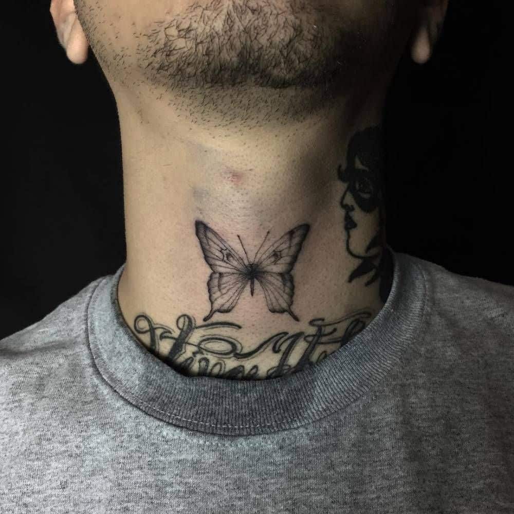 small black and grey delicate tattoo on front of man's neck of a realistic butterfly