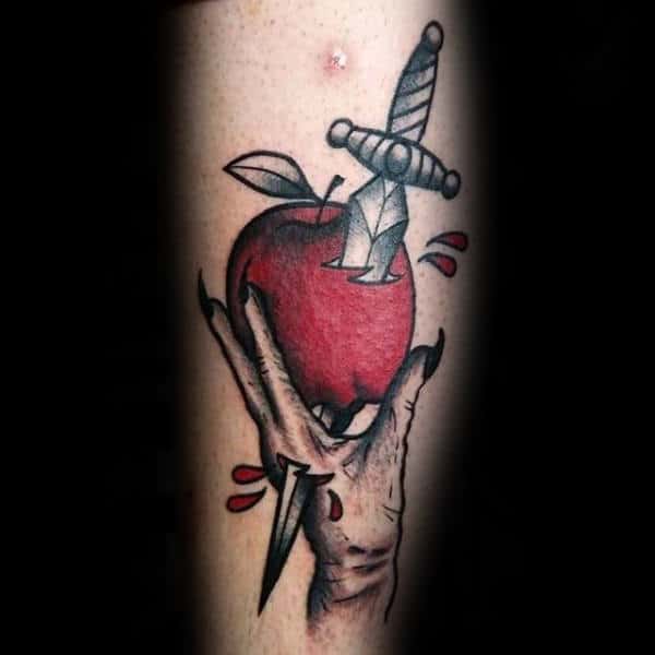 Dagger Through Apple Guys Leg Tattoo Design Ideas