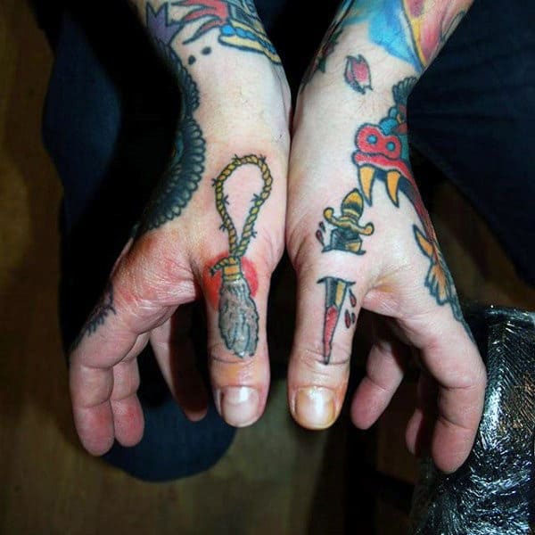 Dagger With Lucky Rabbits Foot Male Thumb Tattoo Design Ideas