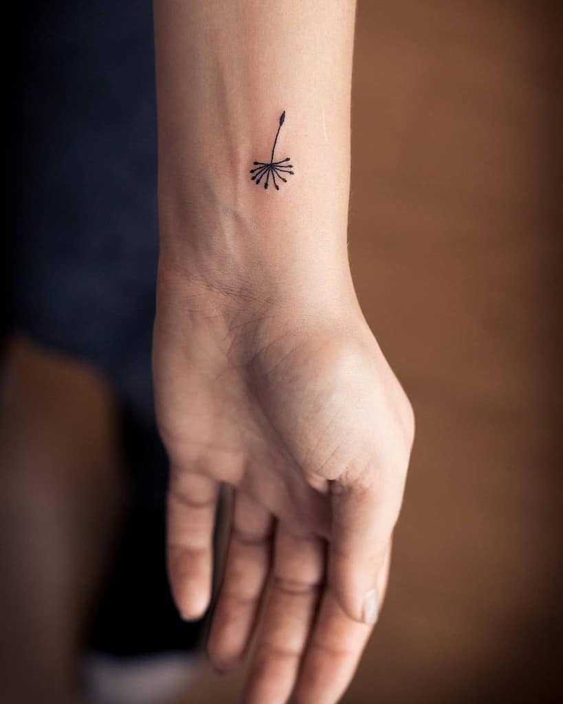 dandelion hand poked tattoo