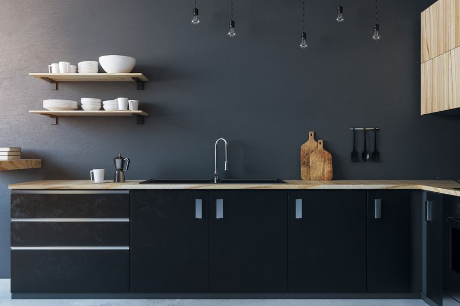 dark gray accent wall black cabinet kitchen 