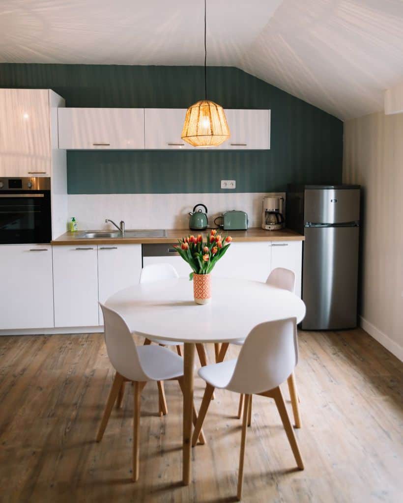 white cabinet kitchen wood flooring 