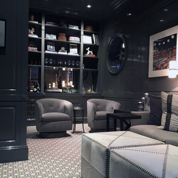 modern home office couch ottoman wall shelves 