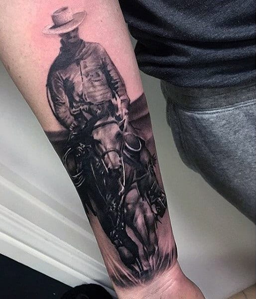 Dark Shaded Black Man On Horse Tattoo On Forearm
