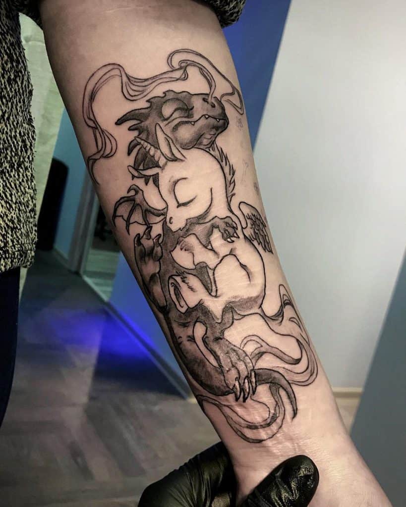 Darkskinned Dragon Entwined In Embrace With Negative Space Unicorn Unique Tattoo
