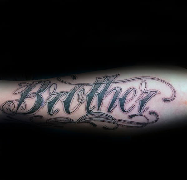decorative ornate male brother word script tattoo on outer forearm