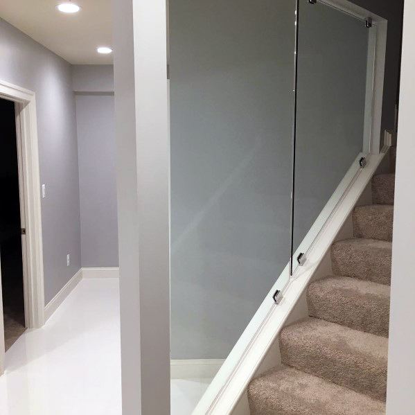 staircase with glass railing 