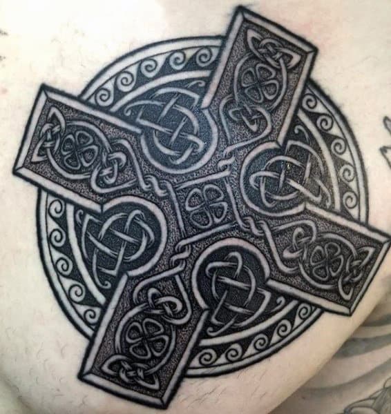 Detailed Celtic Cross Male Chest Tattoo