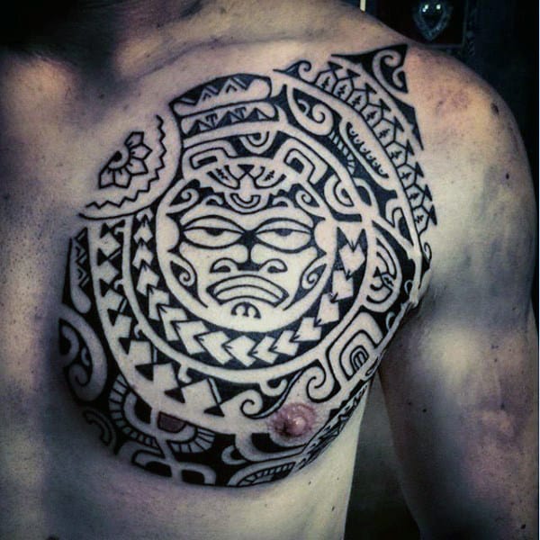 Detailed Male Tribal Chest And Shoulder Tattoos