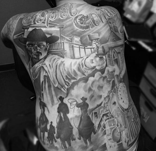 Detailed Western Scene With Script On Mans Back In Black And White