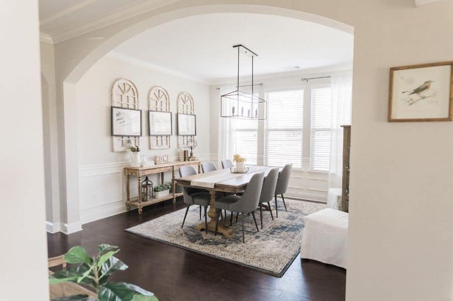 modern farmhouse dining room with track lighting 