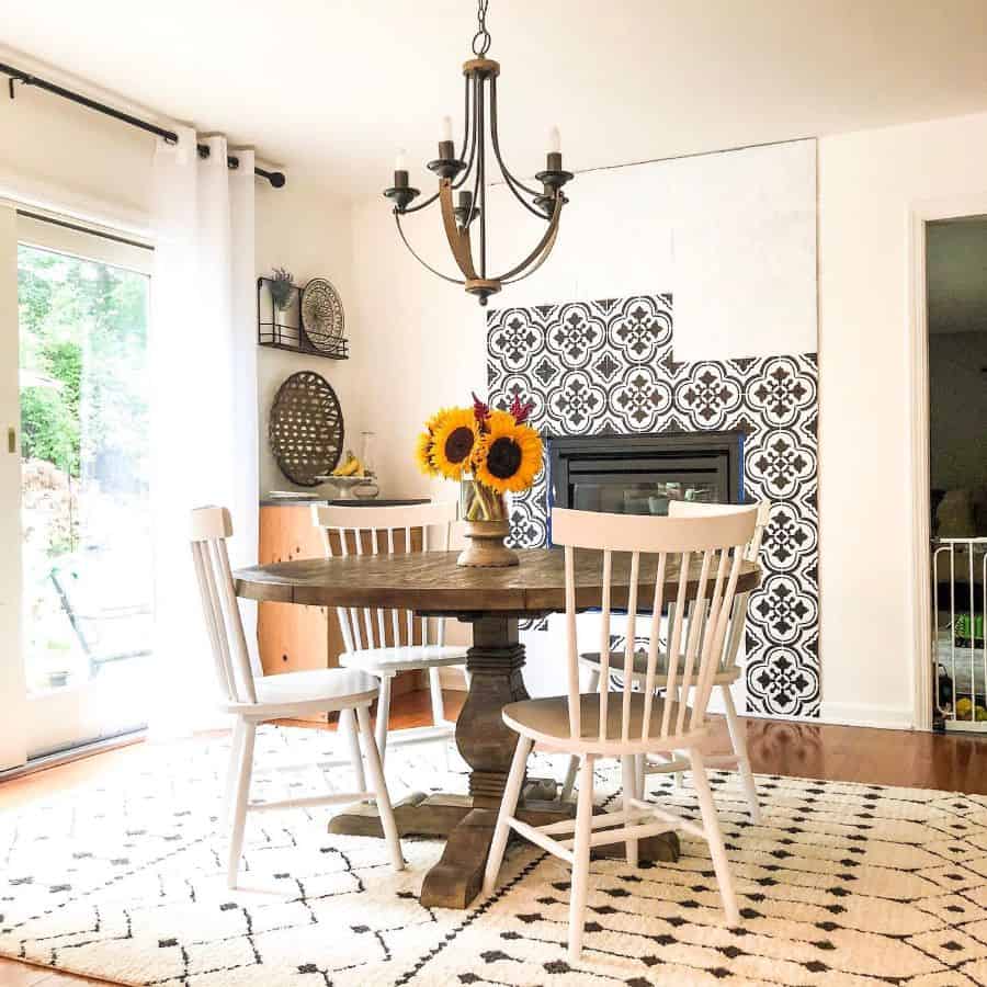 farmhouse dining room with pattern tile fireplace 