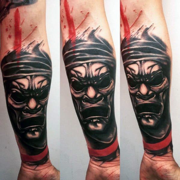 Distinctive Male Red And Black Tattoo Designs On Forearm
