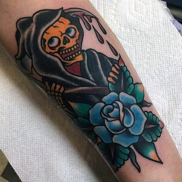 Distinctive Male Traditional Reaper With Blue Rose Flower Forearm Tattoo Designs
