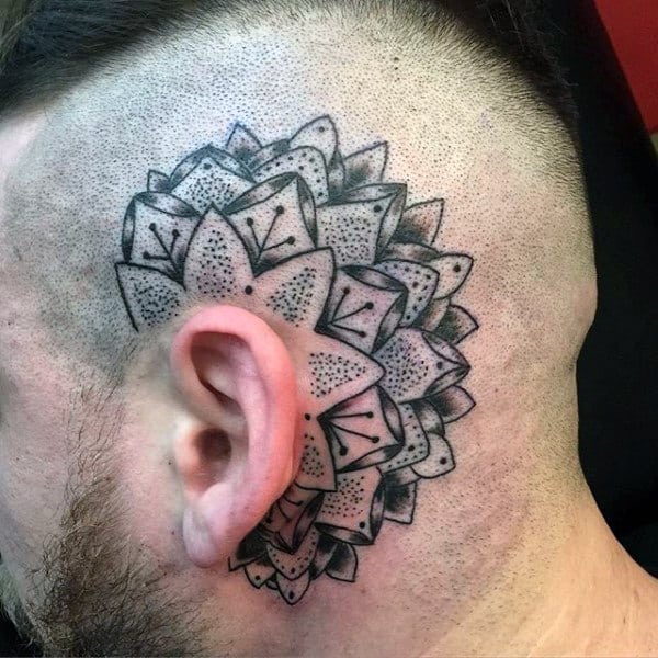 Dotwork mandala tattoo surrounding the right ear