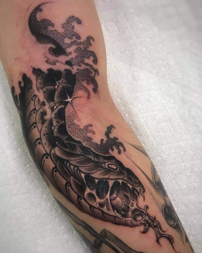 dotwork snake arm tattoo kvntattoos