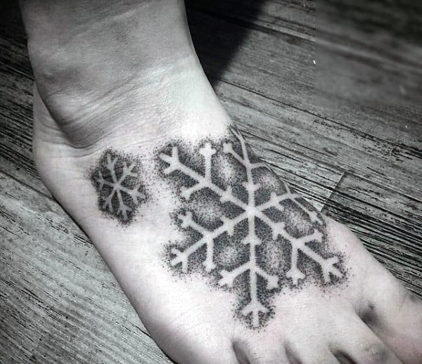 Dotwork Snowflake Negative Space Guys Foot Tattoo