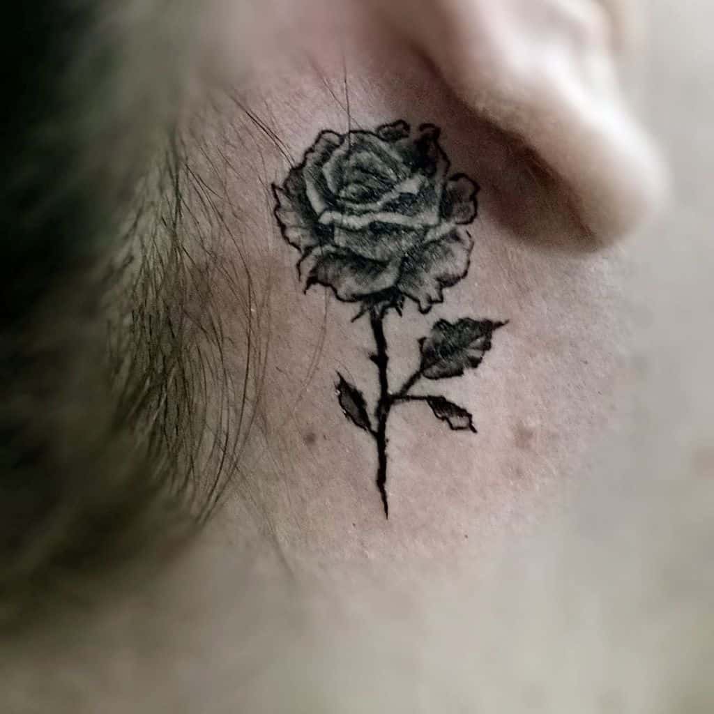 ear tiny rose tattoos negro_saul_tats