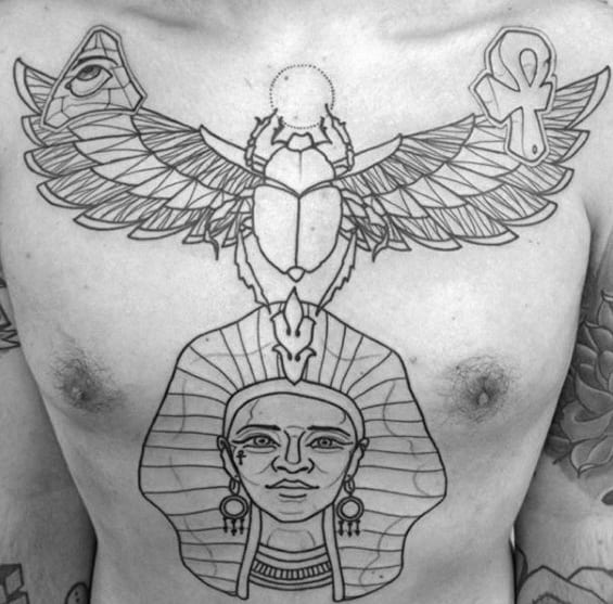 egyptian themed male scarab black ink outline tattoo on chest
