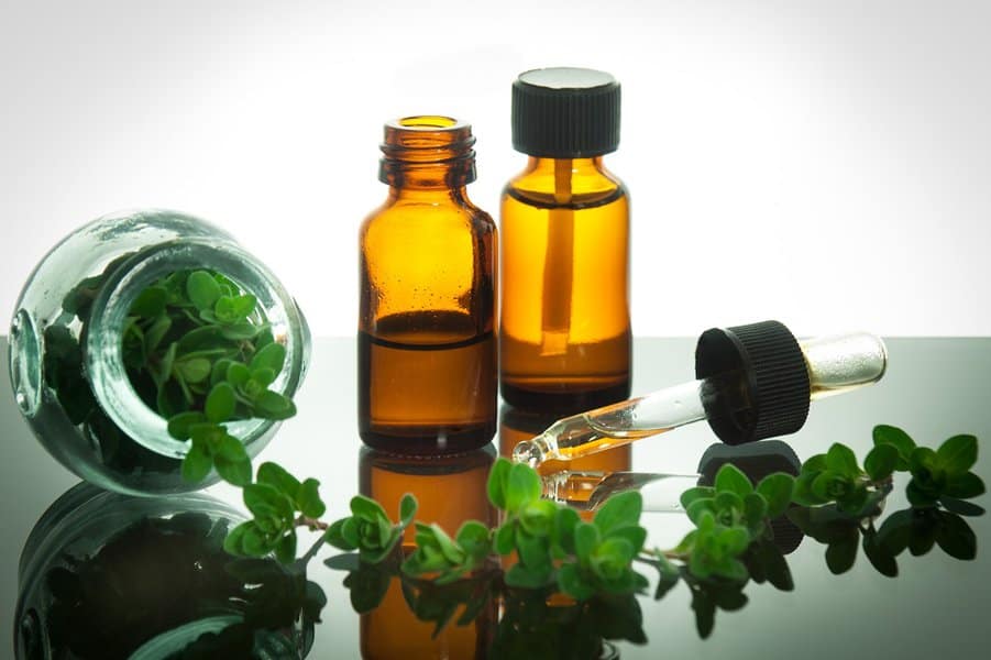 essential oil with oregano leaves