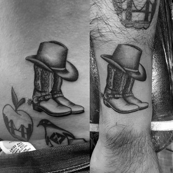 Snake in a cowboy boot and cowboy hat done by Ping  Dekalb Tattoo Company  in Dekalb Illinois This was taken 5 days after bc I couldnt get a good  picture while