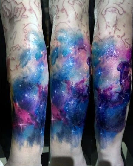 Fabulous Watercolored Effect Universe Tattoo On Elbows Men
