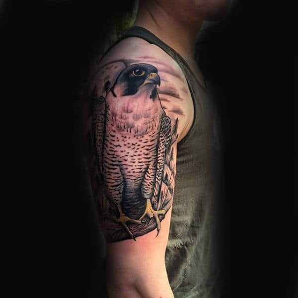 Falcon Tattoo On Mans Upper Arm