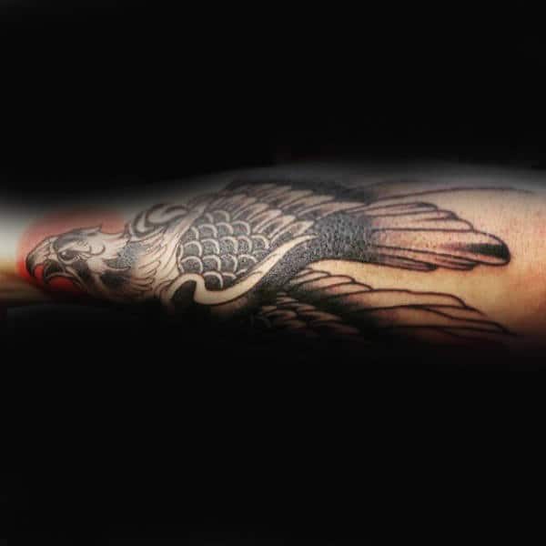 Falcon With Red Gun Outerforearm Male Tattoo Designs