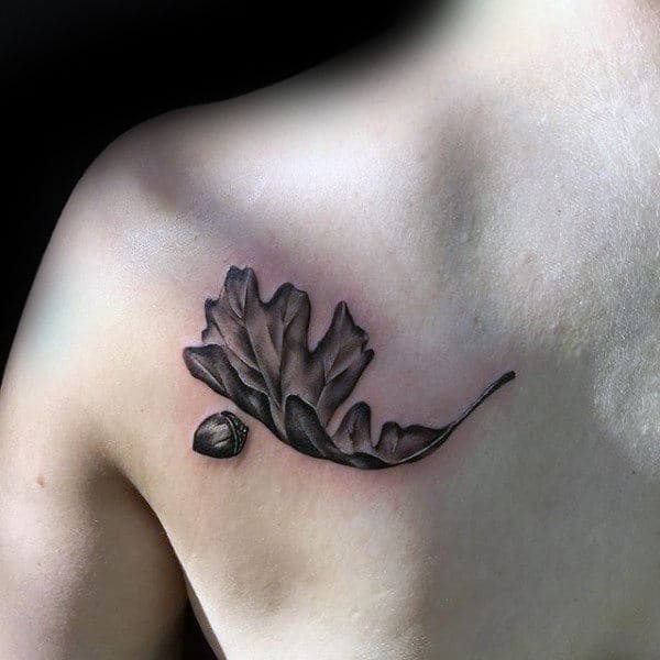 Falling Oak Leaf With Acorn Mens Upper Chest Tattoos