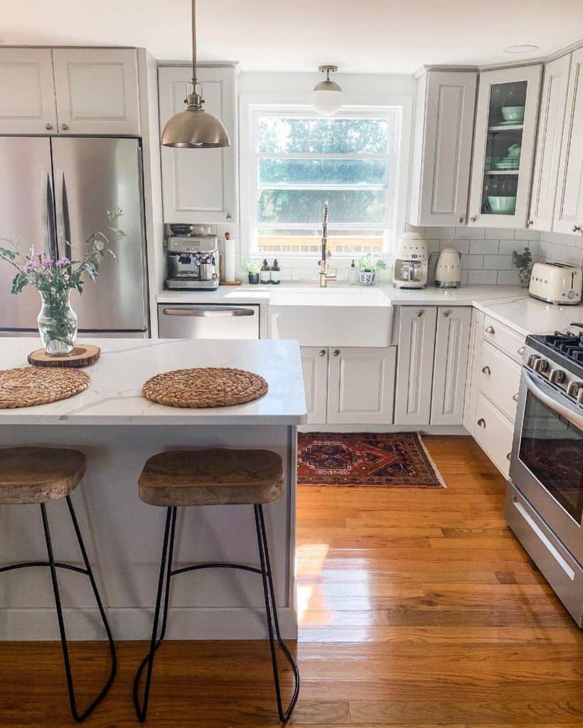 farmhouse kitchen white cabinets gray granite countertop apron sink 