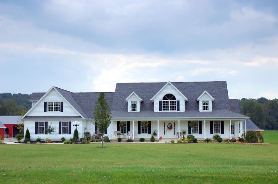large luxury white exterior farmhouse