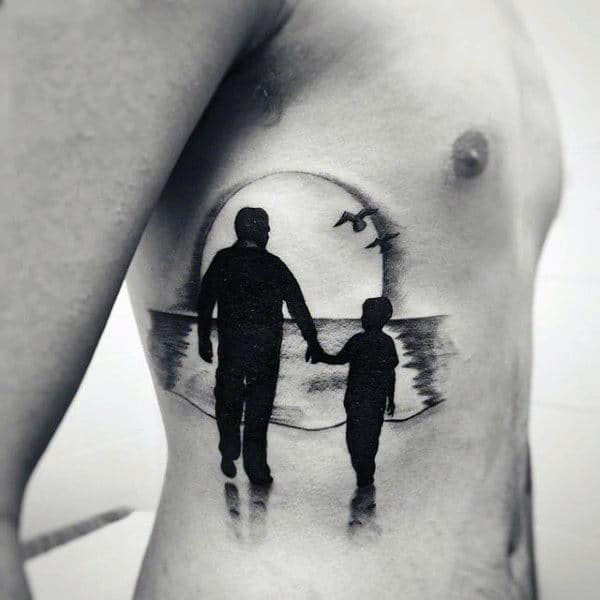Father And Son Beach Tattoo On Rib Cage Side
