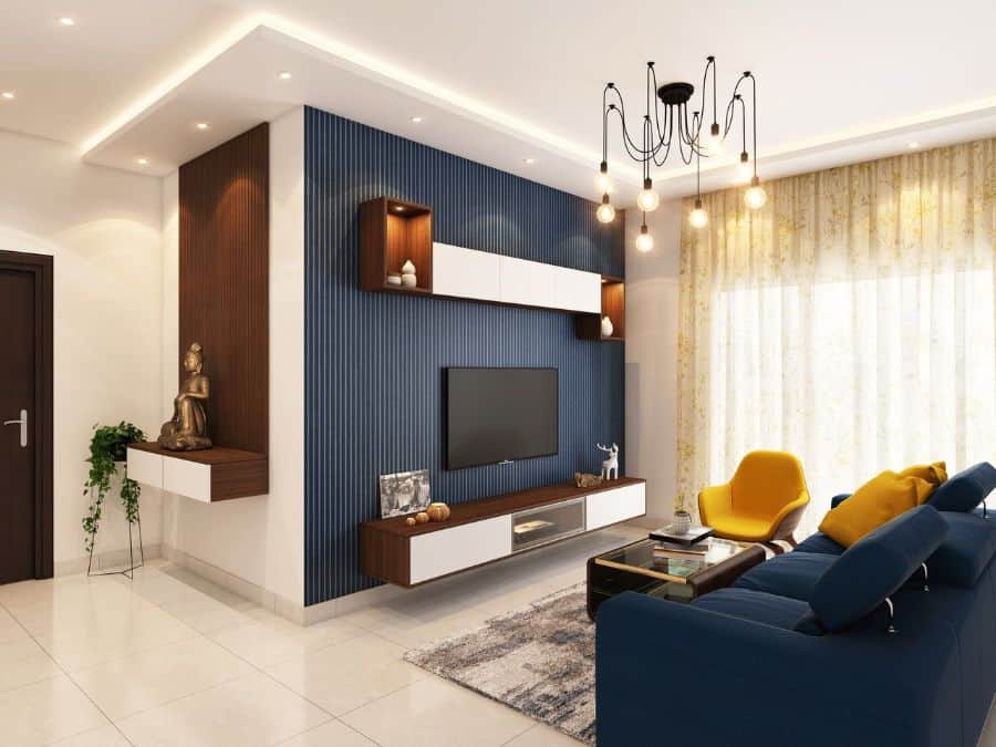 textured blue feature wall in modern apartment living room with blue sofa 