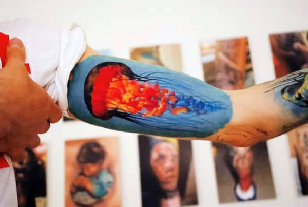 Fiery Blazing Red Blue Jellyfish Tattoo Mens Forearms
