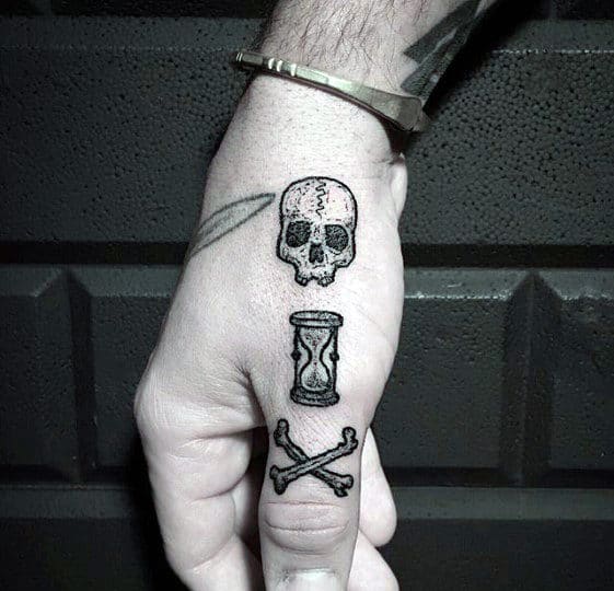 Finger And Hand Guys Traditional Hourglass With Skull And Cross Bones Tattoo