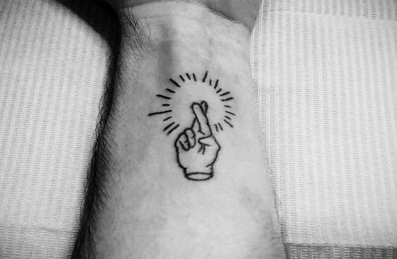 Fingers Crossed Guys Tiny Pop Art Tattoos On Wrist