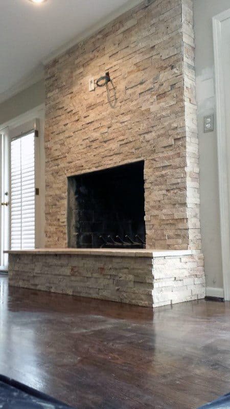 textured stone tile fireplace 