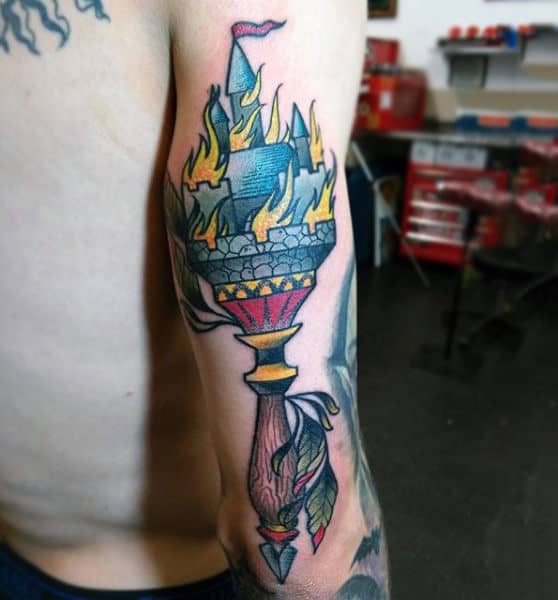 Flaming Torch Castle Tattoo On Back Of Arm Mens Tattoos