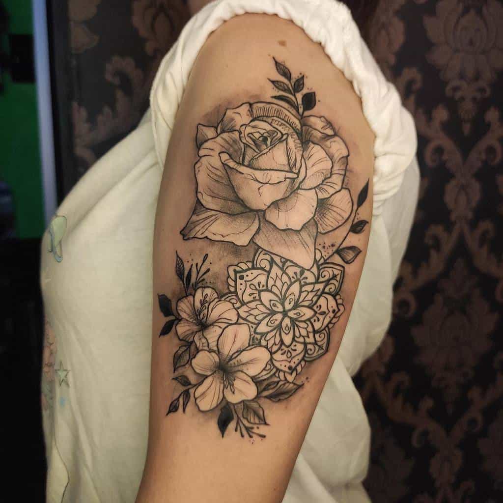 flower black arm tattoo dogo_tattoos