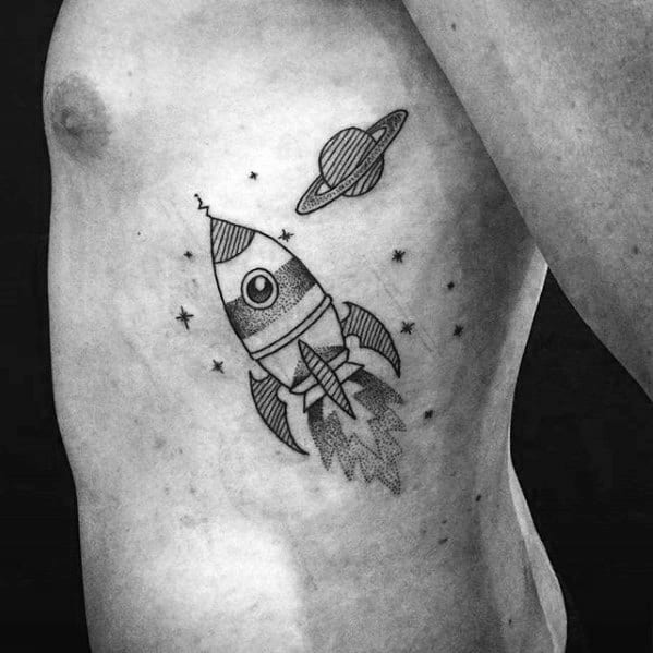 Flying Rocket Ship With Planet Guys Rib Cage Side Tattoo