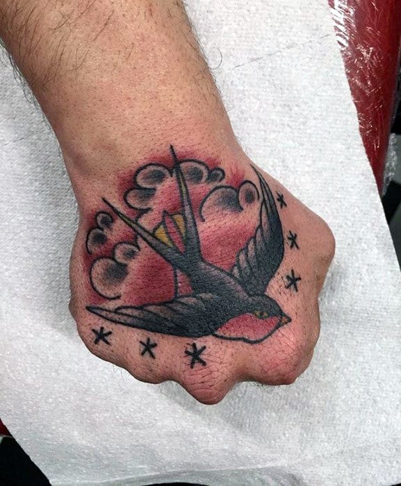 Flying Sparrow Traditional Mens Hand Tattoo