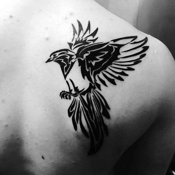Flying Tribal Bird Black Ink Shoulder Tattoo On Man