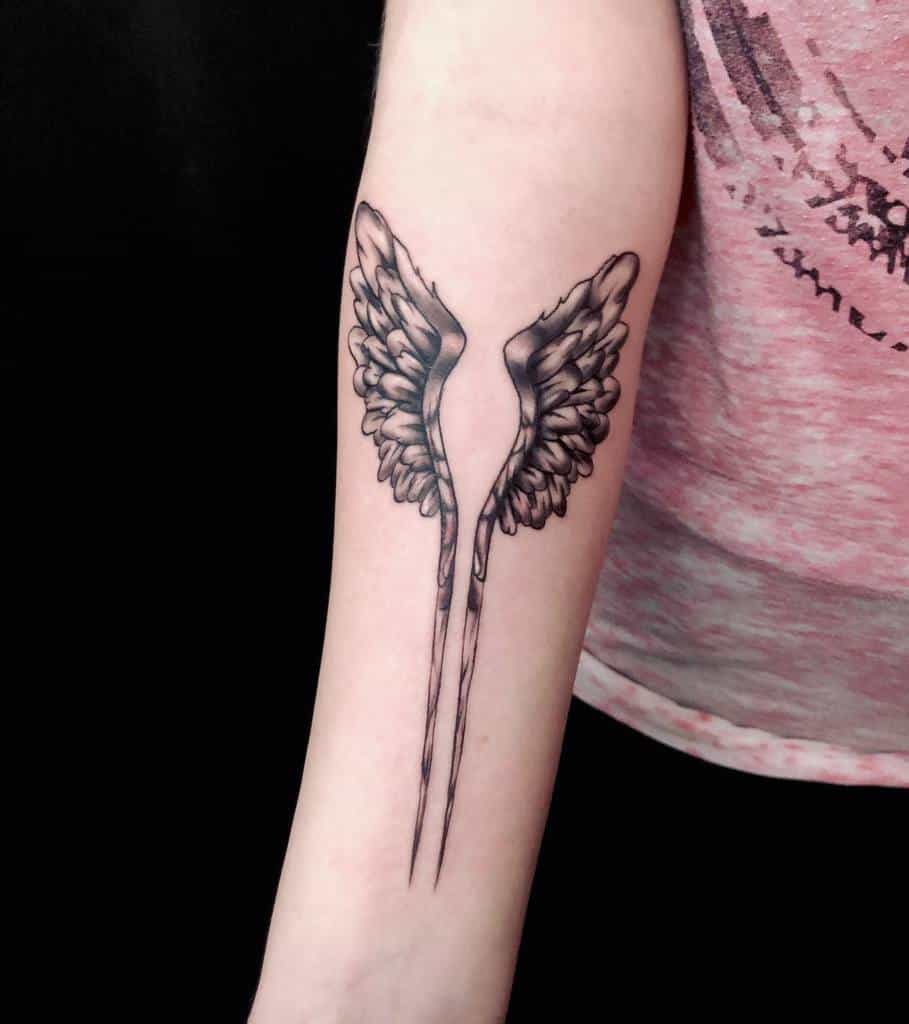 forearm-angel-wing-tattoo-scarffinkorporated