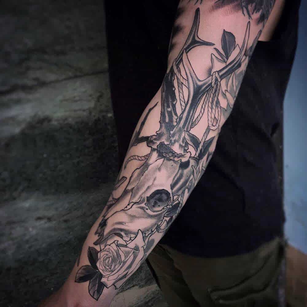 forearm deer skull tattoo operatredici_tattoostudio
