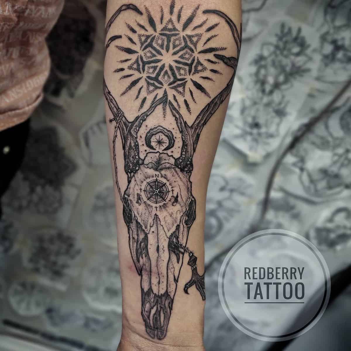 forearm deer skull tattoo rbt_joonas