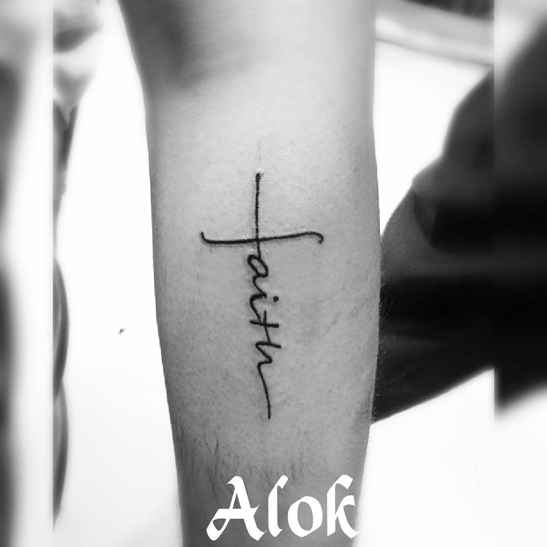 forearm faith cross tattoo aloktattooist